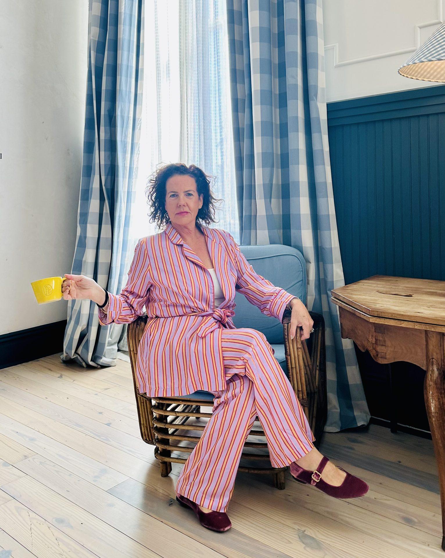 woman in pink pajamas indoors