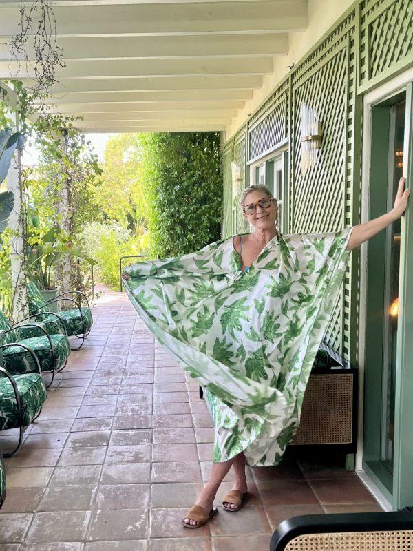 woman in a palm print tunic